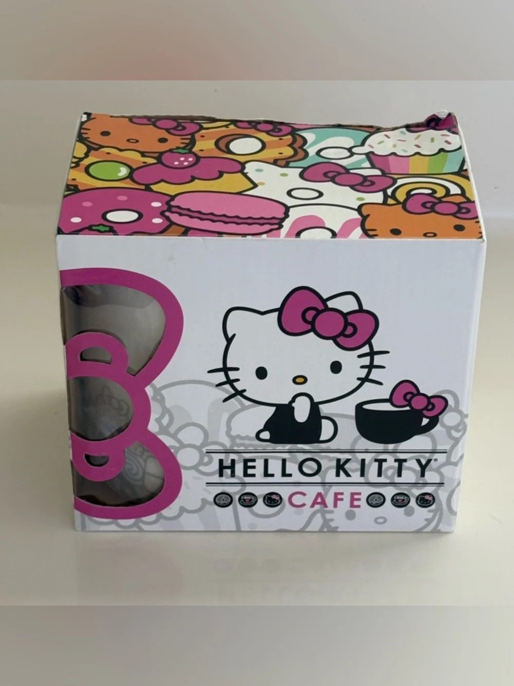 NIB Hello Kitty Cafe White Mug Pink Handle Gray Graphics Logo Box Artwork 12 oz